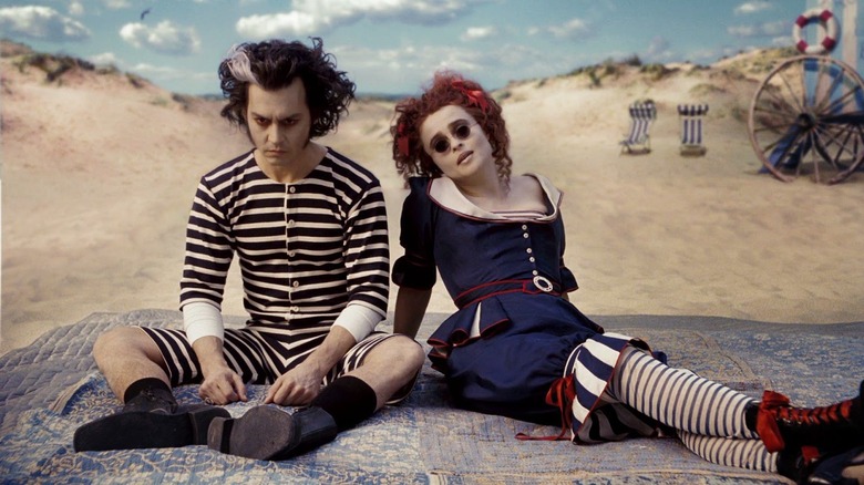 Sweeney and Mrs. Lovett sit on the beach