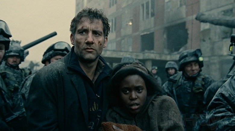 Clive Owen protects an expectant mother