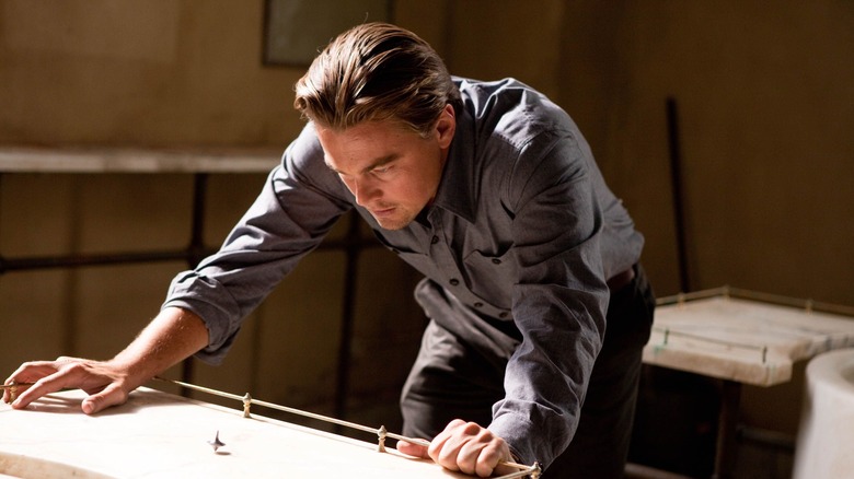 DiCaprio stares at a top