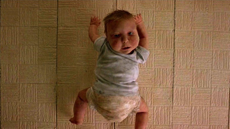 The Dead baby, crawling over Renton's ceiling