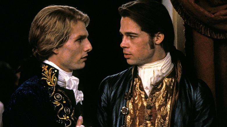 interview with the vampire's tom cruise and brad pitt staring at each other