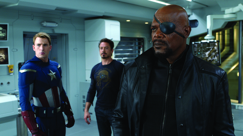 Steve Rogers, Tony Stark, and Nick Fury worriedly look ahead in The Avengers