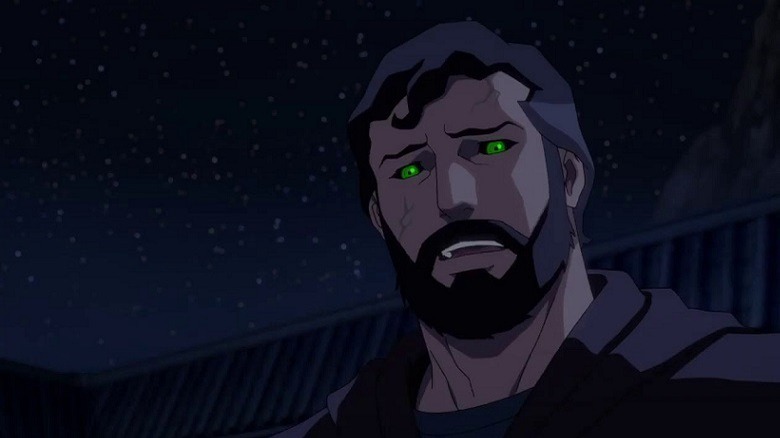 A bearded aged superman with green kryptonite eyes looks distraught