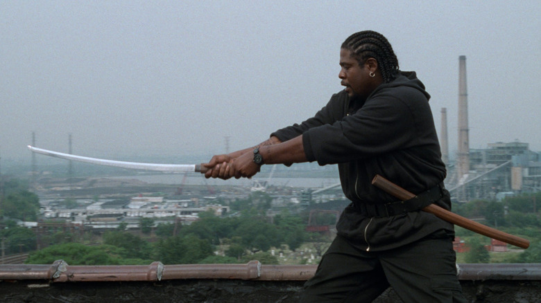 Forest Whitaker as Ghost Dog, wielding a katana in Ghost Dog: The Way of the Samurai