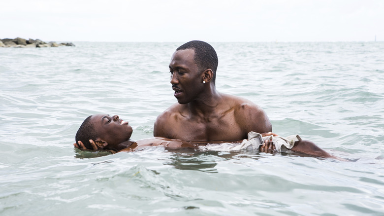 Juan (Mahershala Ali) teaching Chiron (Alex R. Hibbert) how to swim in Moonlight