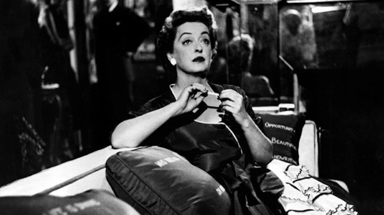 Bette Davis sitting 