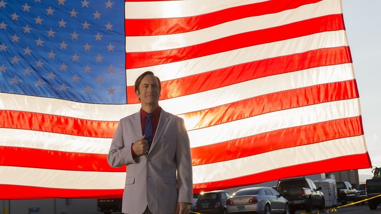 Jimmy in front of American flag