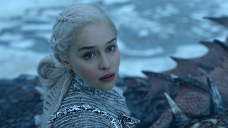 Emilia Clarke's Daenerys Targaryen looking up in Game of Thrones