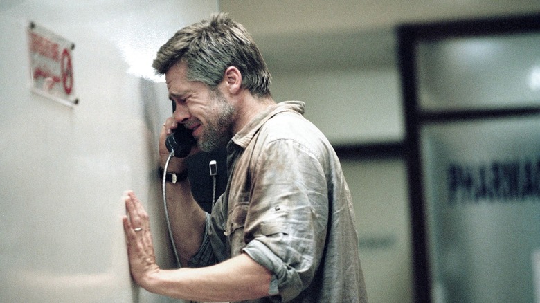 Brad Pitt crying on phone