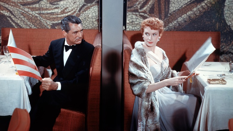 Cary Grant and Deborah Kerr in separate booths