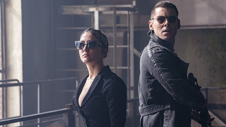 Ereńdira Ibarra and Brian Smith in "The Matrix Resurrections"