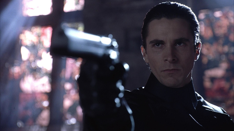 Christian Bale pointing gun in Equilibrium