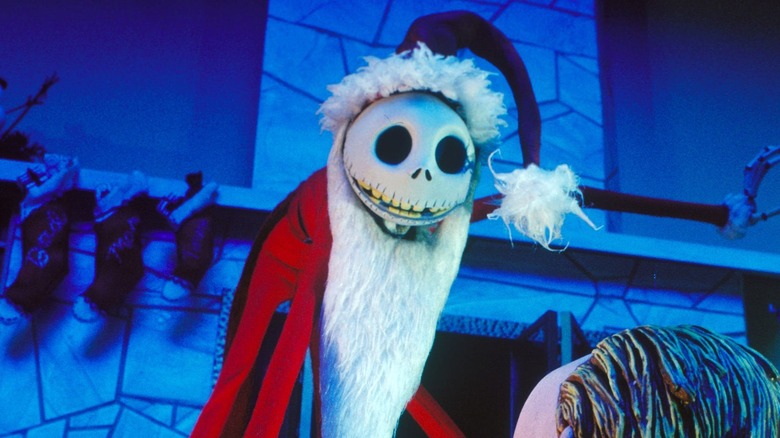 Jack Skellington in Santa suit greeting child