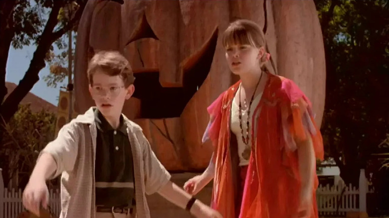 Marnie (Kimberly J. Brown) and Dylan (Joey Zimmerman) see sister in Halloweentown