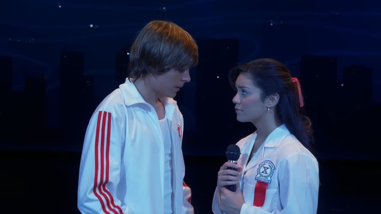 Troy (Zac Efron) and Gabriella (Vanessa Hudgens) sing in High School Musical