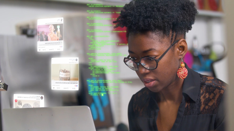 A Black woman looks at internet code