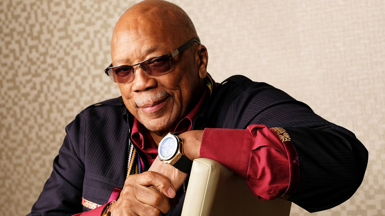 Quincy Jones poses with watch