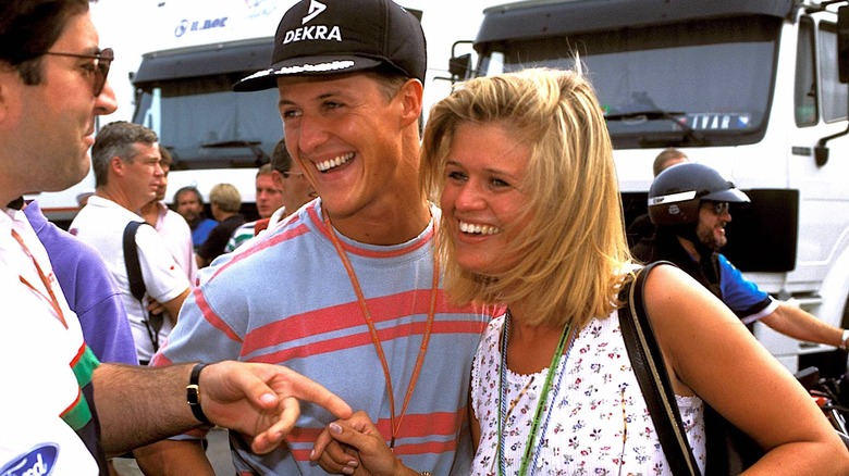 Michael Schumacher and his wife smile gleefully