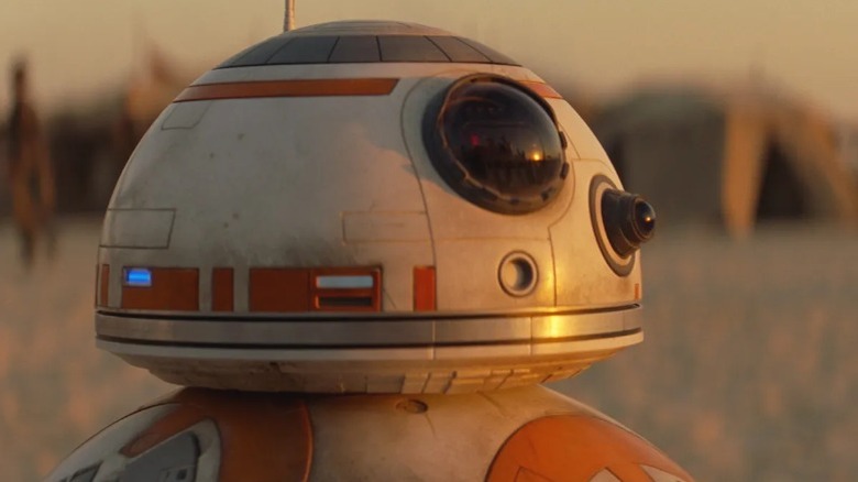 BB-8 rolling across the desert with Rey