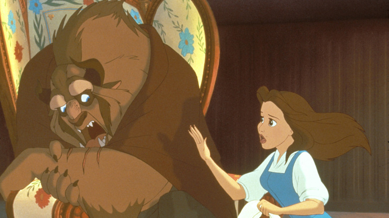 Belle trying to dress the Beast's wounds in Beauty and the Beast