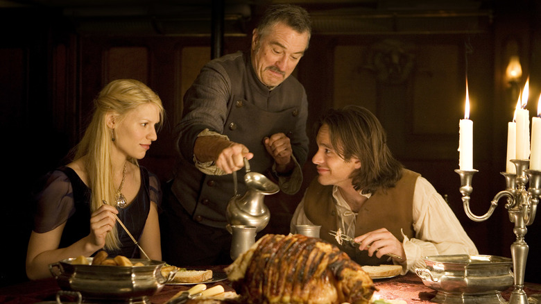 Tristan and Yvaine being served dinner by Captain Shakespeare in Stardust