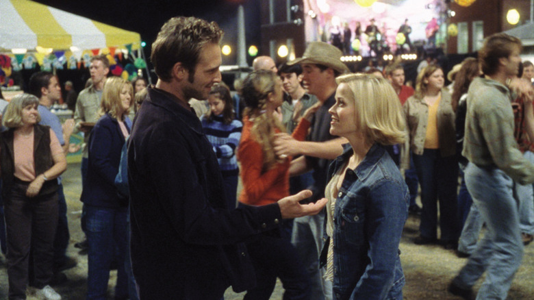 Melanie and Jake about to dance at fair in Sweet Home Alabama