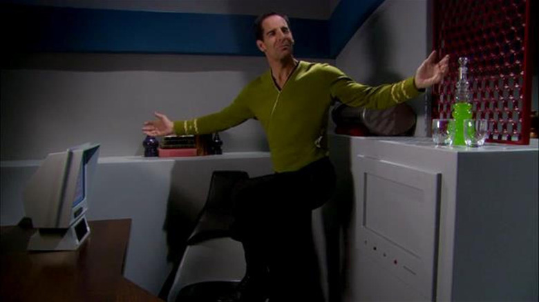 Mirror Archer (Scott Bakula) proudly wears the Defiant captain's uniform in Star Trek: Enterprise