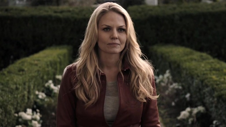 Jennifer Morrison as Emma Swan standing in a garden in in Once Upon a Time