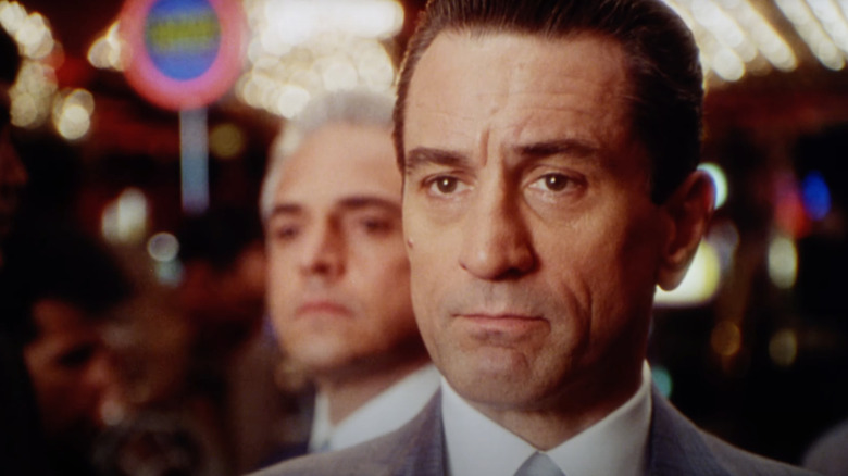 Robert De Niro as Sam "Ace" Rothstein stands inside a casino in Casino