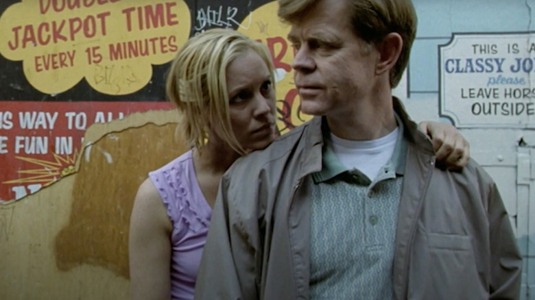 Maria Bello as Natalie Belisario with her arm around William H. Macy as Bernad Lootz in The Cooler