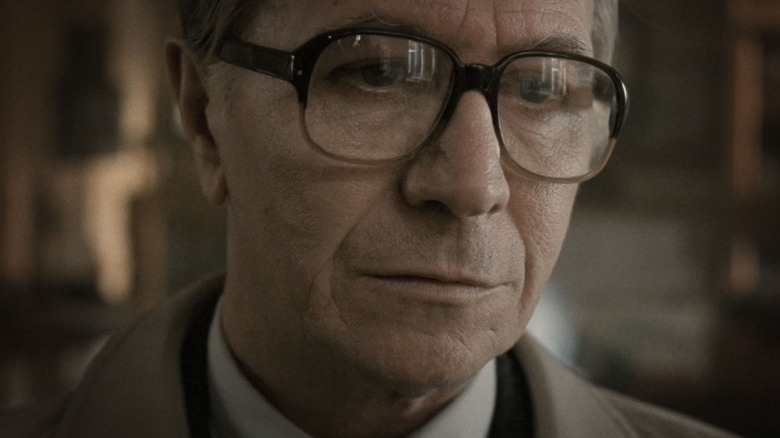 Tinker Tailor Soldier Spy George Smiley looking suspicious