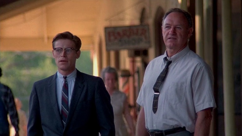 Willem Dafoe and Gene Hackman standing