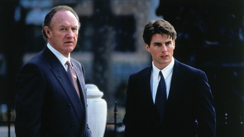 Gene Hackman standing with Tom Cruise