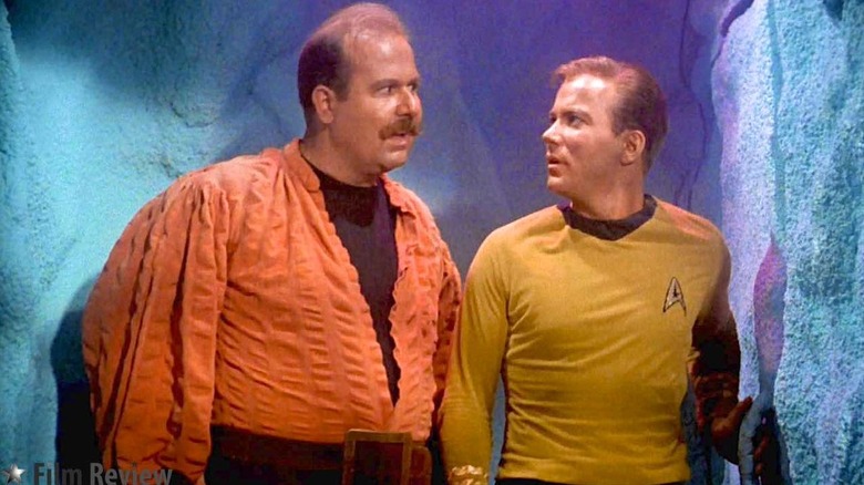 Harry Mudd (Roger C. Carmel) speaks with Captain Kirk (William Shatner) on Star Trek: The Original Series