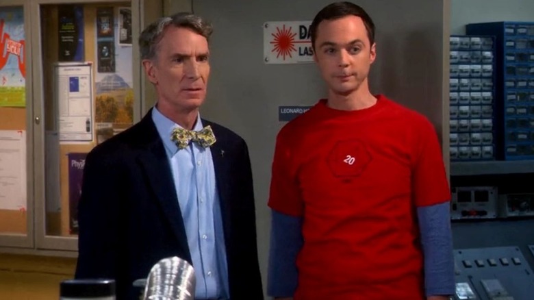 Bill Nye as himself stands next to Jim Parsons as Sheldon Cooper as they stand in the doorway of Leonard Hofstadter's lab on The Big Bang Theory