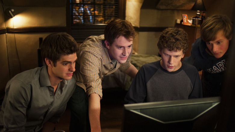 Mark Zuckerberg and friends hacking