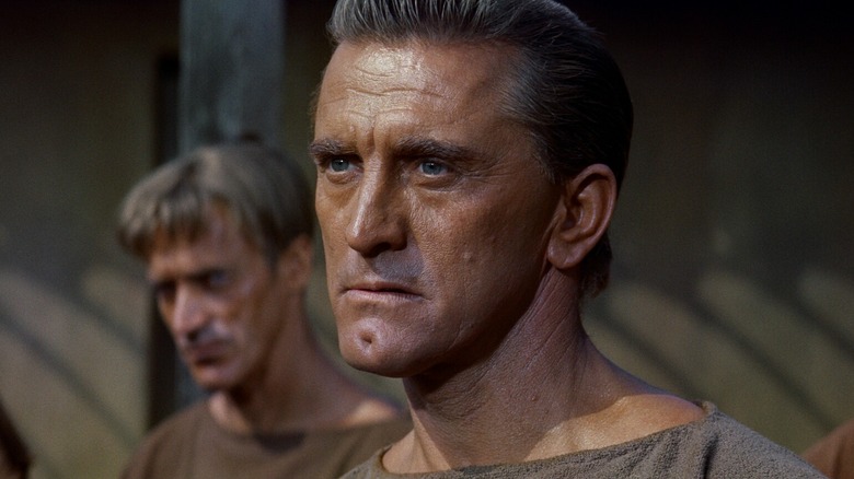 Charlton Heston as Spartacus