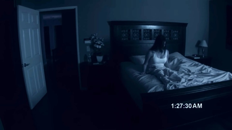 Paranormal Activity dark bedroom scene