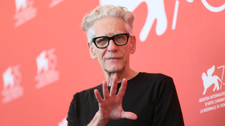 David Cronenberg holds out hand