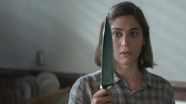 Castle Rock's Lizzy Caplan holding knife