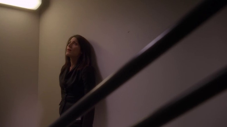 Lisa Edelstein as Dr. Lisa Cuddy in a stairwell on House