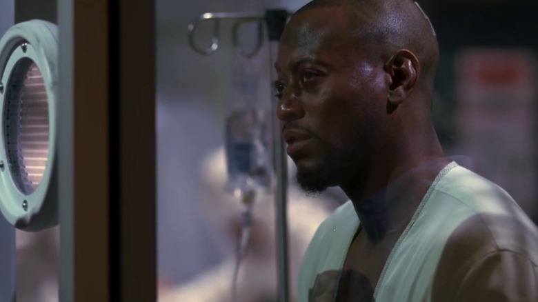 Omar Epps as Dr. Eric Foreman looking ill on House