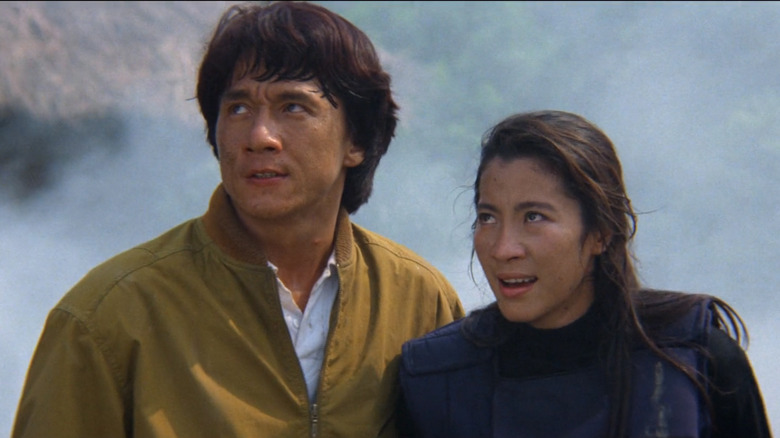 Jackie Chan and Michelle Yeoh look tired among smoke in Police Story III: Supercop