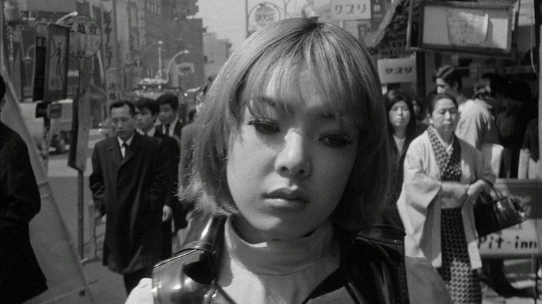 Funeral Parade of Roses Eddie walks through Tokyo