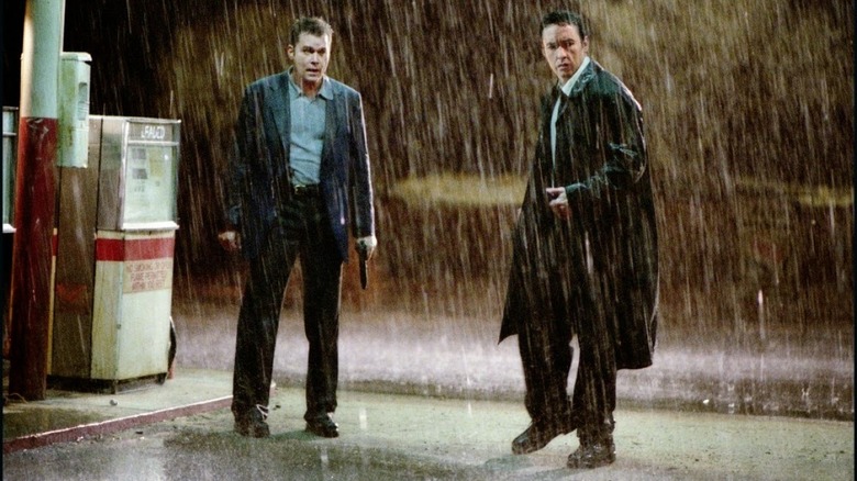 Cusack and Ray Liotta in the rain