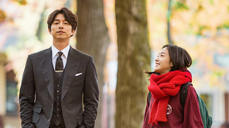 Kim Shin (Gong Yoo) walks with Eun-tak (Kim Go-eun) in Guardian: The Lonely and Great God