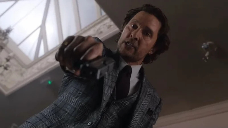 Matthew McConaughey pointing gun