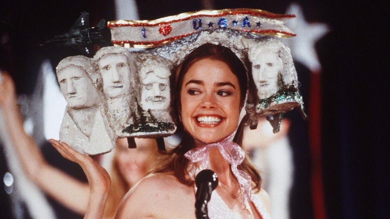Denise Richards with Mount Rushmore on her head in Drop Dead Gorgeous.