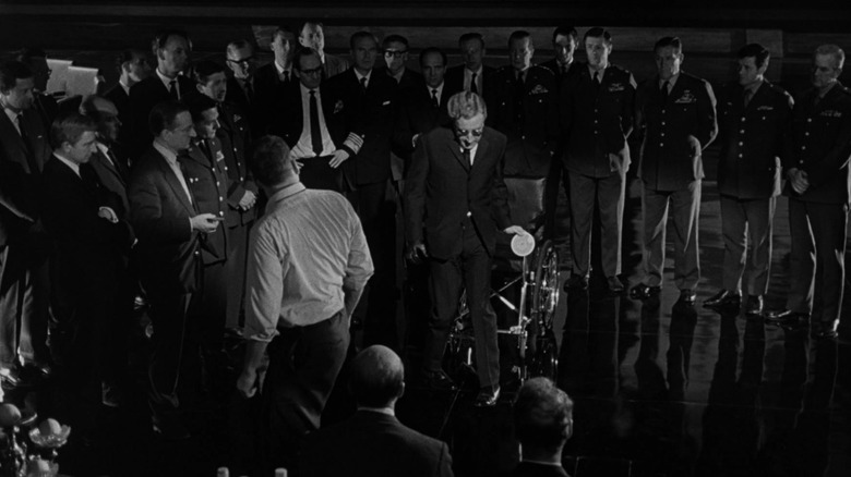 Peter Sellers as Dr. Strangelove, standing up from his wheelchair in the film Dr. Strangelove