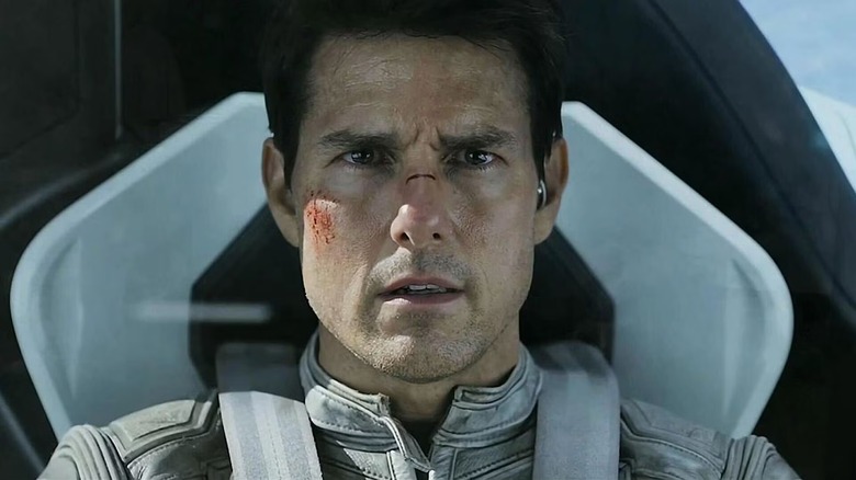 Jack Harper (Tom Cruise) is lightly wounded while piloting in Oblivion